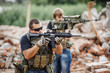 © kaninstudio - Private Military Contractor on patrol in destroyed city