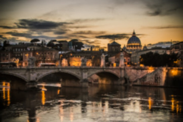 Artistic dark blur edit of the view of Vatican City, Rome at sunset