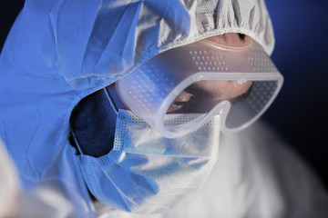 Canvas Print - close up of scientist face in chemical lab