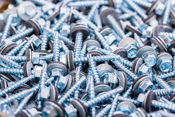 Many screws arranged as background