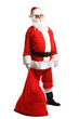 © opolja - Full length portrait of a Santa Claus posing near a bag