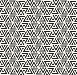 Wall Mural - monochrome dense vector pattern of triangles.