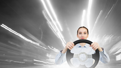 Woman with steering wheel