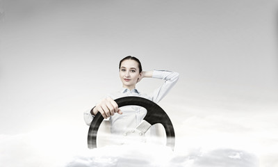 Wall Mural - Woman with steering wheel