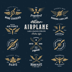 Vintage Vector Airplane Labels Set with Retro Typography. Shabby Texture on Blue Background