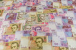© RomanR - different ukrainian banknotes background close-up