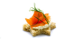 Canape In Star Shape With Smoked Salmon For Christmas, Isolated
