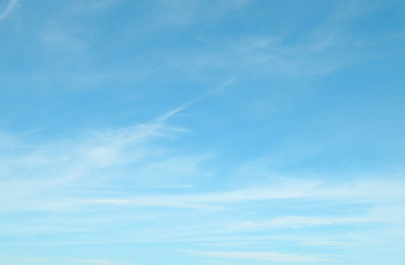fluffy clouds in the blue sky