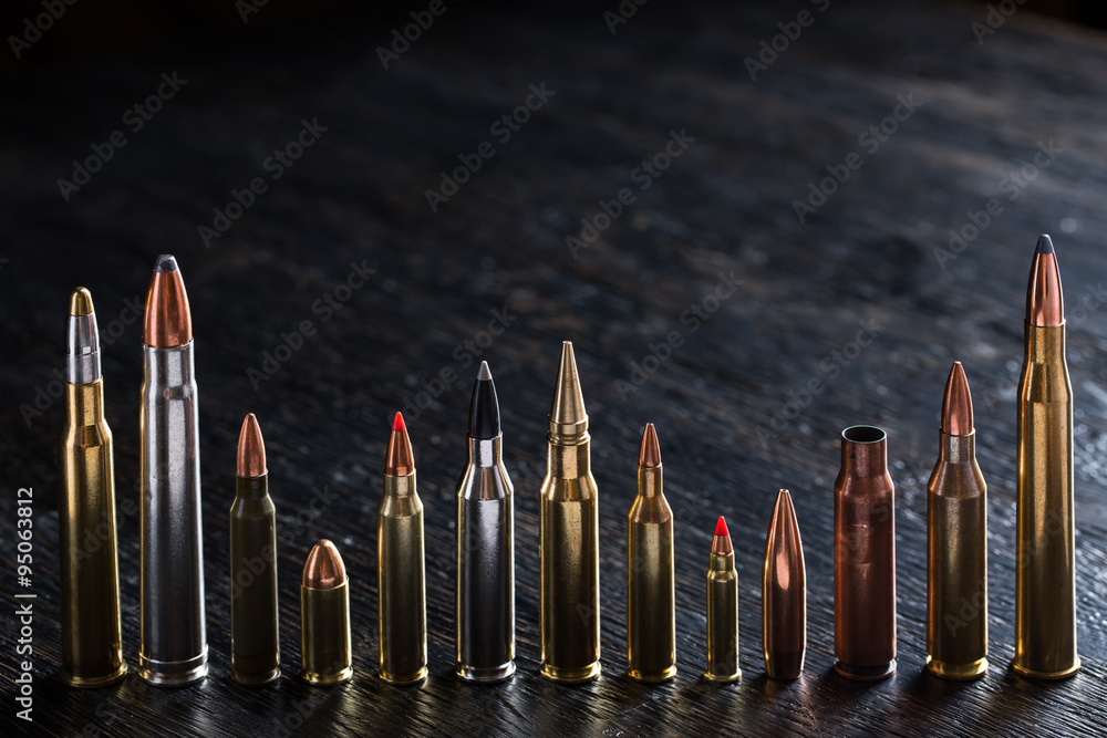 Number of large-caliber ammunition with different caliber - obrazy, fototapety, plakaty 