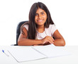 © asierromero - girl doing homework on a white background