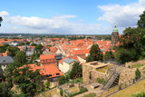 Fototapeta Niebo - View towards Pirna cityscape with St. Marys Church from Sonnenstein castle