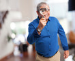 © asierromero - man looking with magnifying glass