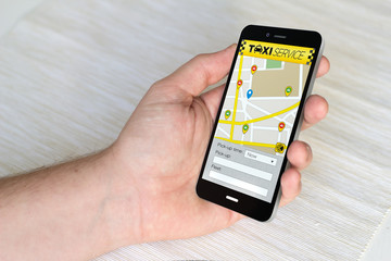 Canvas Print - smartphone with taxi application on the screen