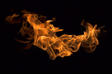 The Red Flames On A Black Background.