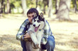 © lester120 - The young man and the Siberian Husky