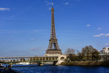Fototapeta Paryż - River Seine Embankment with Eiffel Tower (La Tour Eiffel). Paris