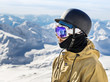 © maxoidos - Portrait of snowboarderat ski resort