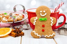 Christmas Gingerbread Man Cookie Table Scene With Hot Chocolate And Twinkling Silver Background