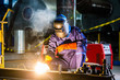 © Kzenon - Welder working in industrial factory