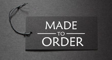 Made To Order Text On A Black Tag