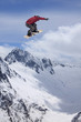 © Vasily Merkushev - Flying snowboarder on mountains, extreme sport