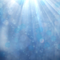 Wall Mural - underwater sparkling sun beams from above