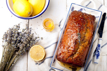 Wall Mural - Lavender, lemon cake with fresh lemons and lavender flowers