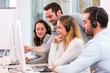 © Production Perig - Young attractive people learning their new job at call center