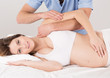 © Photographee.eu - Pregnant woman at the physiotherapist