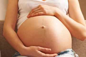 Wall Mural - Pregnant woman at home