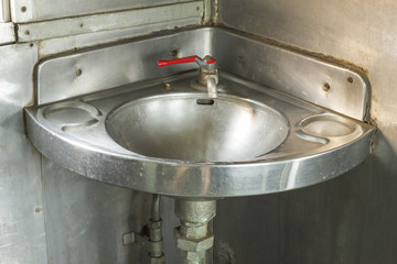 stainless steel Hand Wash Basin on a restroom of trains