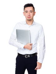 Canvas Print - Asian Businessman hold with laptop computer