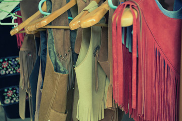 women clothes hanging on a rack clothes store, selective focus o