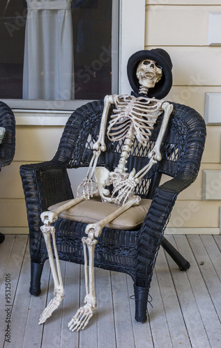 Human Skeleton Sitting In A Chair Buy This Stock Photo And