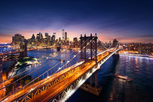 New York City - Beautiful Sunset Over Manhattan With Manhattan And Brooklyn Bridge