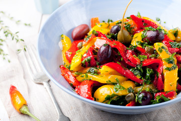 Roasted yellow and red bell pepper salad. Grilled vegetables.