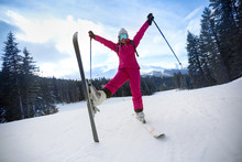 Carefree Young Woman In Ski Suit