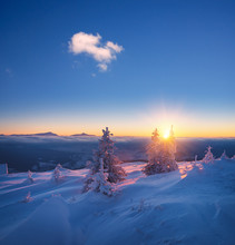 Winter Landscape With Rising Sun