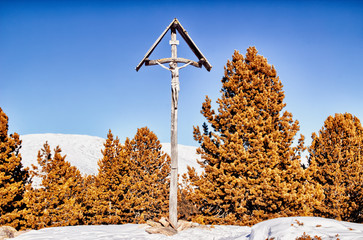 Wall Mural - the crucifixion of Jesus Christ on top of the dolomites alps