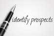 pen writes identify prospects on white blank paper