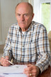 © Daisy Daisy - Concerned Senior Man Reviewing Domestic Finances