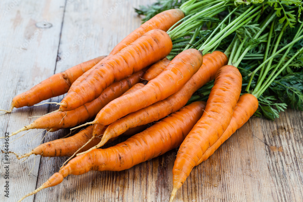 Obraz na płótnie fresh carrots bunch w salonie