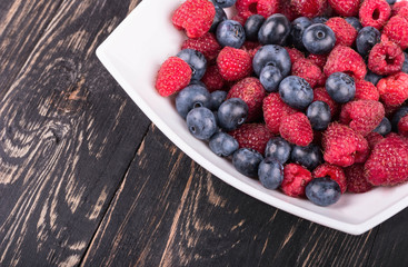 Wall Mural - Raspberries with blueberries