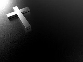 silver cross on black background with clipping path