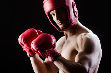 Wall Mural - Muscular man in boxing concept