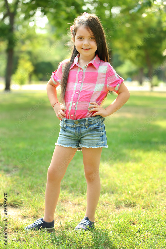 Happy little girl in the park