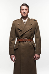 Wall Mural - Military uniform fashion man against white background.