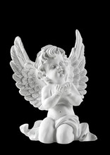 Little White Guardian Angel Isolated On Black Background