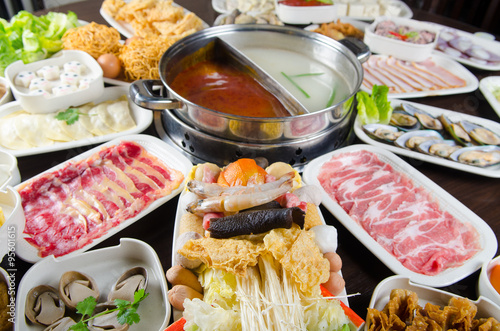 Fotografie, Obraz hot pot soup with wide variety of ingredients