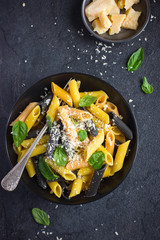 Canvas Print - colorful penne pasta  with parmesan cheese and basil